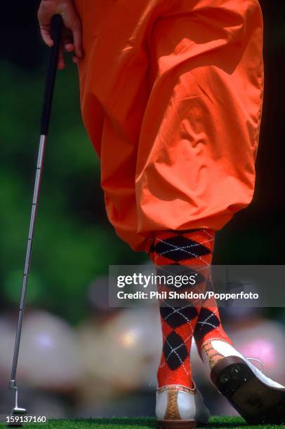 The distinctive fashion style of American golfer Payne Stewart on show at the US Masters golf tournament at the Augusta National Golf Club in...