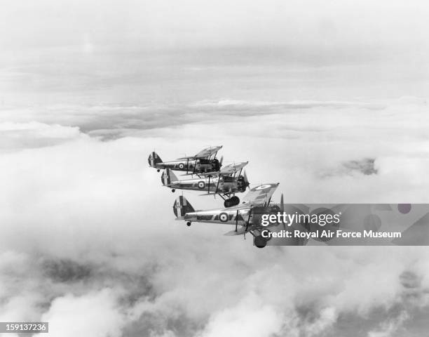 Bristol Bulldogs of 32 Squadron, in formation flight, rehearsing for RAF Display, Wittering, 1935.