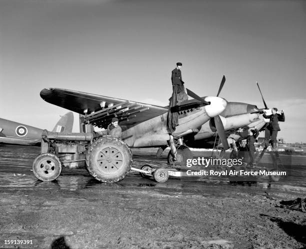 De Havilland Mosquito FB.VI of 143 Squadron Royal Air Force being prepared for flight, Banff February 1945.