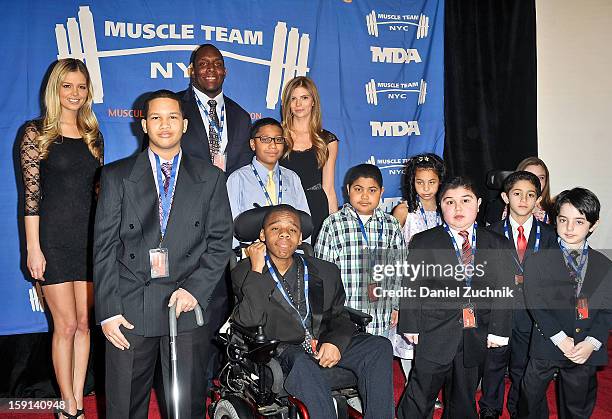 Kevin Boothe with children attend the 16th Annual MDA Muscle Team Gala and Benefit Auction at Pier 60 on January 8, 2013 in New York City.