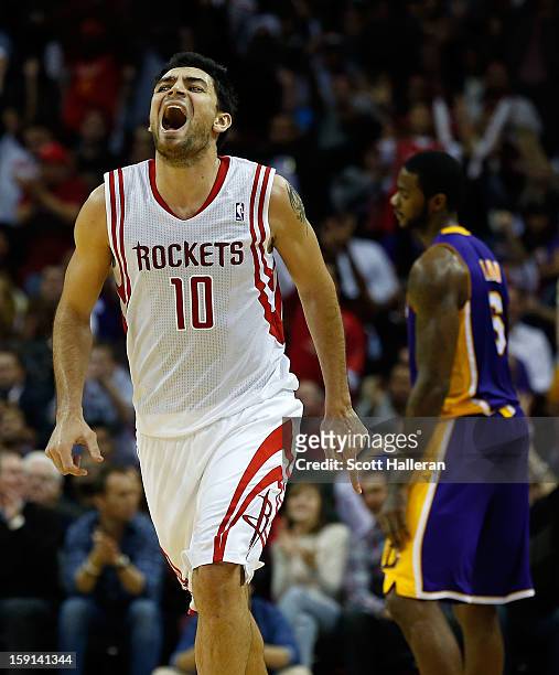 Carlos Delfino of the Houston Rockets celebrates a basket against the Los Angeles Lakers at Toyota Center on January 8, 2013 in Houston, Texas. NOTE...