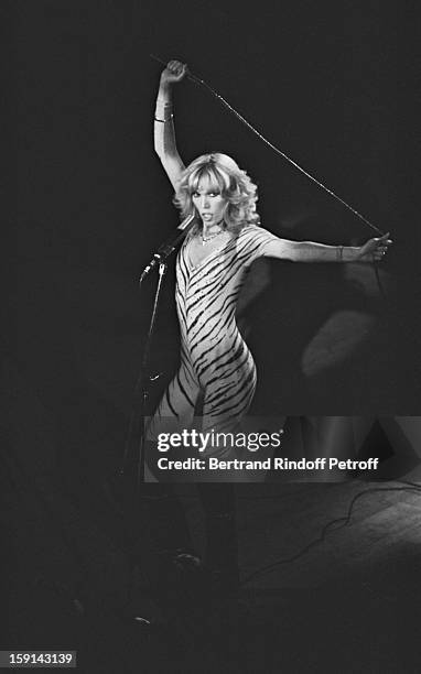 Amanda Lear on stage during a concert at Palace night club in Paris in 1978.