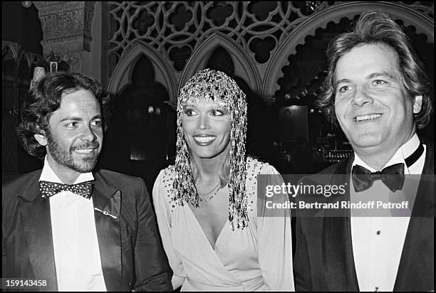 Alain-Philippe Malagnac, Amanda Lear and Massimo Gargia attend a party at night club 78 in Paris in 1979.