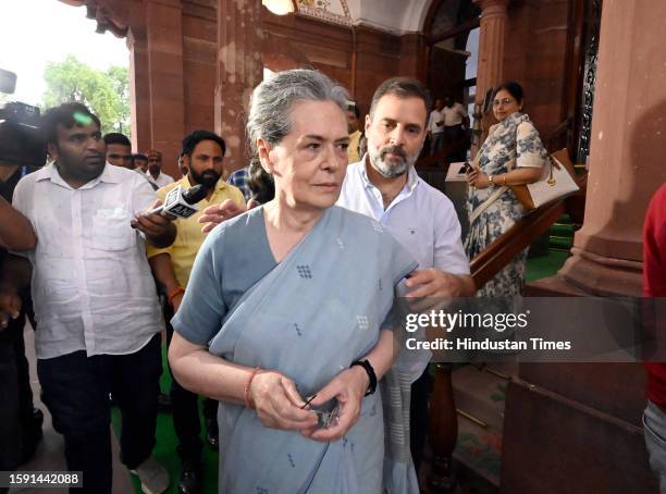 Congress MPs Sonia Gandhi and Rahul Gandhi leave Parliament premises after Opposition MPs stage a walkout from the Lok Sabha during Prime Minister...