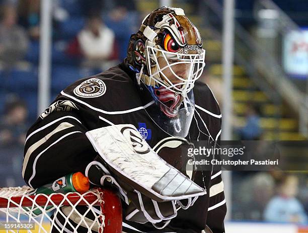 Dany Sabourin of the Hershey Bears spits water during an American Hockey League against the Bridgeport Sound Tigers on January 8, 2013 at the Webster...