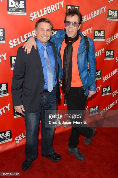 Director and Celebrity Photographer Kevin Mazur and musician Slim Jim Phantom arrive at the premiere of "$ellebrity" at Mann's 6 Theatre on January...