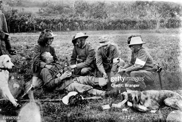 World War I, Italian front. Care given to a Bersagliere on the Karst plateau , 1915.