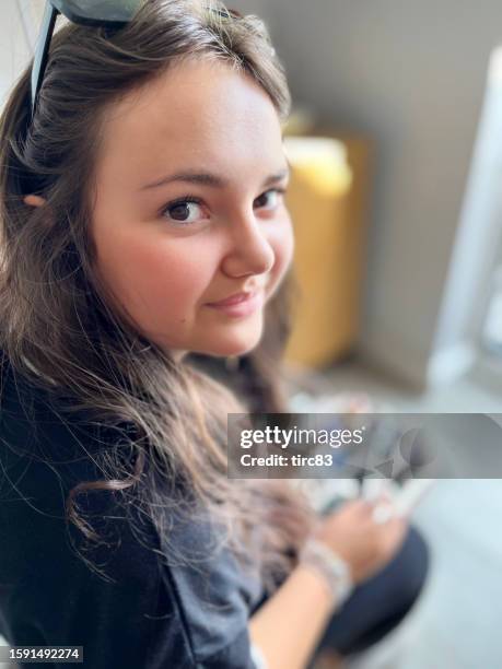 fifteen year old girl with manicure set - taken on mobile device stock pictures, royalty-free photos & images