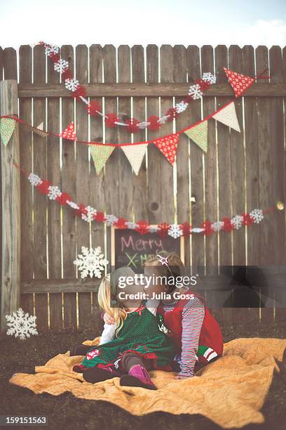 young sisters giving each other kisses - endast flickor bildbanksfoton och bilder