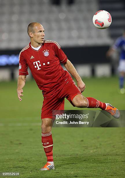 Arjen Robben of Bayern Munich celebrate a goal during the friendly game between FC Bayern Munich and FC Schalke 04 at the Al-Sadd Sports Club Stadium...