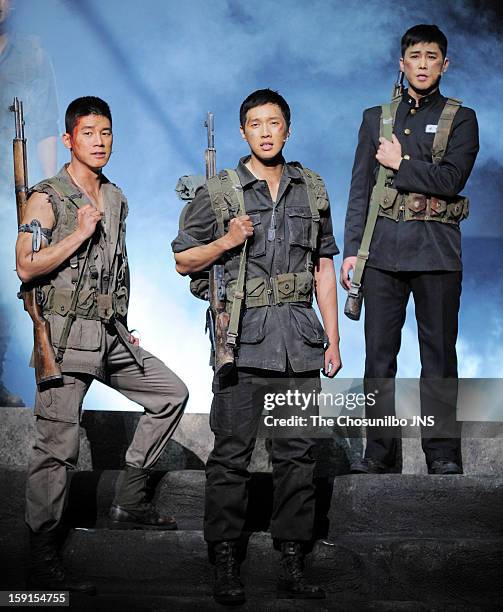 Kim Moo-Yul, Ji Hyun-Woo and Jung Tae-Woo perform during the musical 'The Promise' press call at the National Theater of Korea Main Hall 'Hae' on...