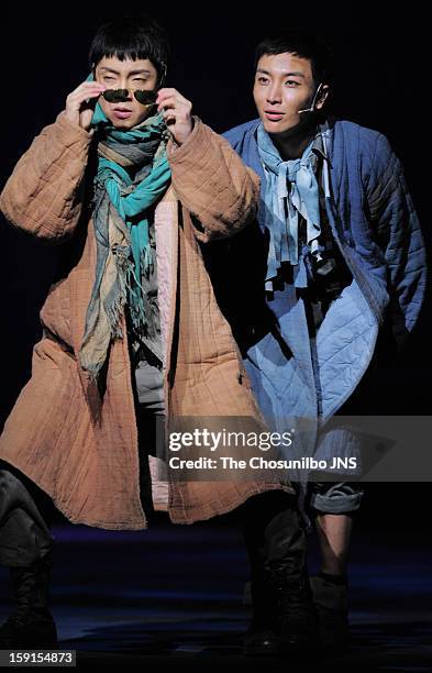 Yoon-Hak of Supernova and Lee-Teuk of Super Junior perform during the musical 'The Promise' press call at the National Theater of Korea Main Hall...