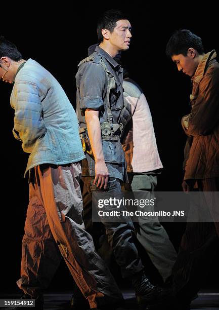 Ji Hyun-Woo performs during the musical 'The Promise' press call at the National Theater of Korea Main Hall 'Hae' on January 8, 2013 in Seoul, South...