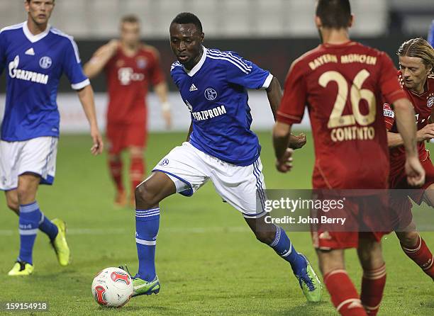 Chinedu Obasi of Schalke 04 in action during the friendly game between FC Bayern Munich and FC Schalke 04 at the Al-Sadd Sports Club Stadium on...