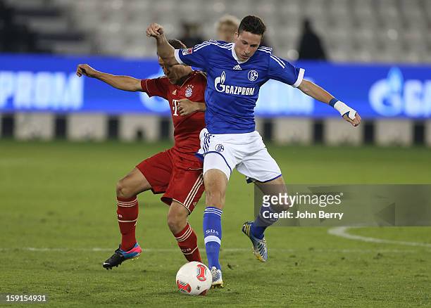 Julian Draxler of Schalke 04 in action during the friendly game between FC Bayern Munich and FC Schalke 04 at the Al-Sadd Sports Club Stadium on...