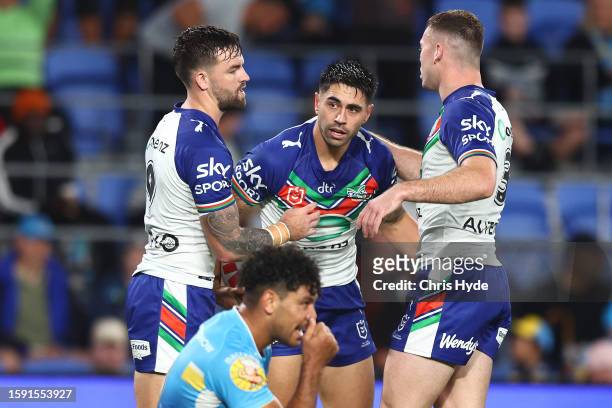 Shaun Johnson of the Warriors celebrates a try during the round 23 NRL match between Gold Coast Titans and New Zealand Warriors at Cbus Super Stadium...