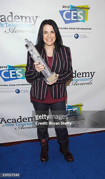 Director Tina Cesa Ward poses with the IAWTV award for Best Drama Directing at the IAWTV Awards at the CES 2013 Show at the Palazzo Theater at the...