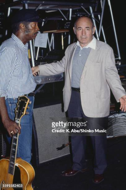 Freddie Green and George Wein talk in rehearsal, location unknown, circa 1970s.