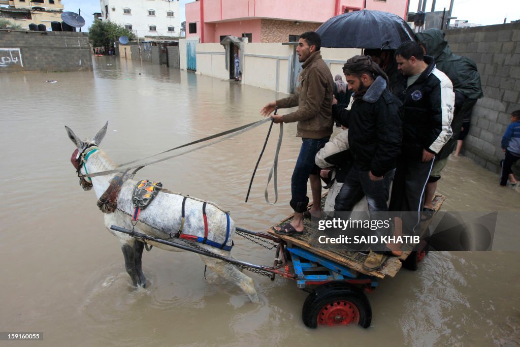 TOPSHOT-PALESTINIAN-GAZA-WEATHER-FLOODS