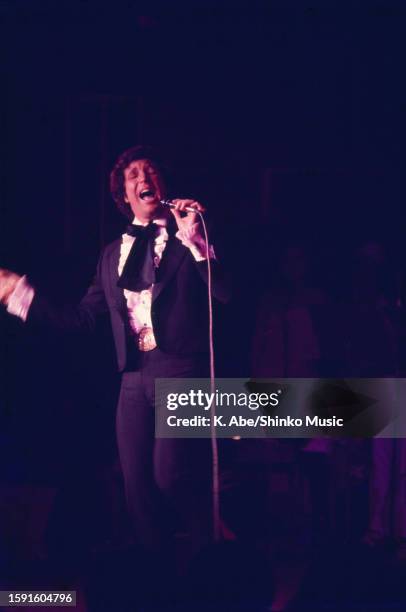 Tom Jones sings at the Latin Quarter, Tokyo, Japan, 21 February 1973.