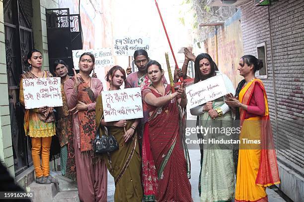 Eunuchs armed with brooms, sticks, sandals and playcards with hard hitting anti-rape slogans on January 4, 2013 in New Delhi, India. Moved by recent...