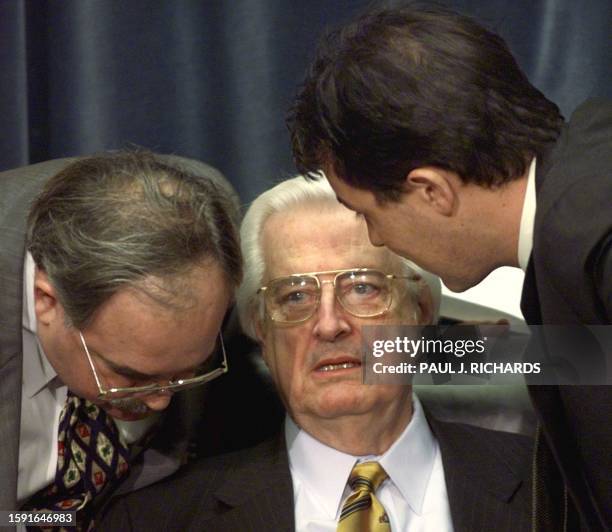 House of Representatives Judiciary Chairman Henry Hyde talks to General Counsel Thomas Mooney Sr. And Minority Chief Counsel Julian Epstein 10...