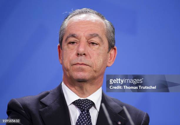 Malta's Prime Minister Lawrence Gonzi is pictured during a press conference at Chancellery with German Chancellor Angela Merkel on January 9, 2013 in...