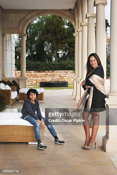 Allegra Curtis an her son Raphael pose for a picture during a portrait session at Hotel Maricel on December 13, 2012 in Palma de Mallorca, Spain.