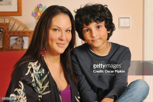 Allegra Curtis and her son Raphael pose for a picture during a portrait session at their home on December 13, 2012 in Palma de Mallorca, Spain.