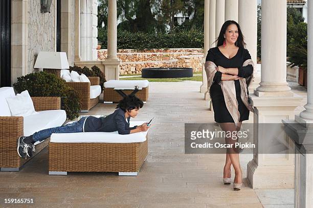 Allegra Curtis an her son Raphael pose for a picture during a portrait session at Hotel Maricel on December 13, 2012 in Palma de Mallorca, Spain.