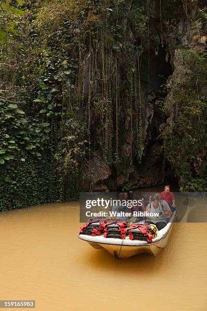 cueva del indio, tourists visiting cave by boat - vinales cuba stock pictures, royalty-free photos & images