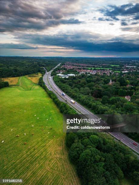 aerial view of motorway and housing development - crawley - west sussex stock pictures, royalty-free photos & images