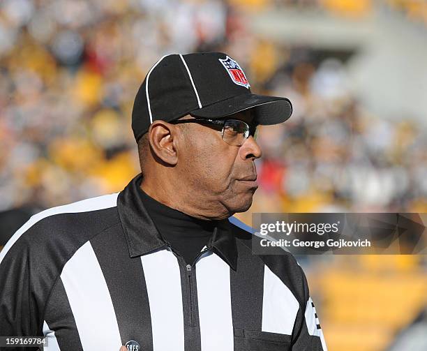 National Football League umpire Chad Brown looks on from the field during a game between the Cincinnati Bengals and Pittsburgh Steelers at Heinz...