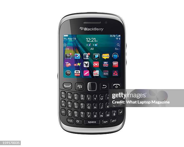 BlackBerry Curve 9320 smartphone, photographed on white, taken on May 25, 2012.