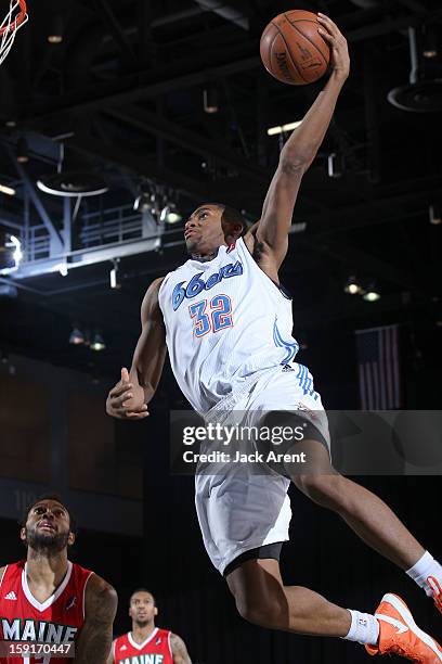 Hollis Thompson of the Tulsa 66ers slam dunks the ball against the Maine Red Claws during the 2013 NBA D-League Showcase on January 8, 2013 at the...