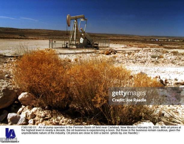 An oil pump operates in the Permian Basin oil field near Carlsbad, New Mexico February 26, 2000. With oil prices at the highest level in nearly a...
