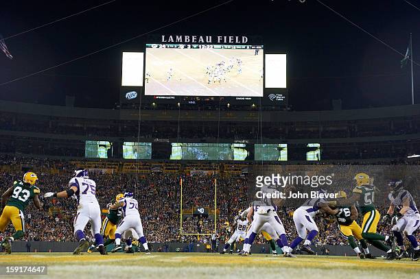 Playoffs: Rear view of Minnesota Vikings QB Joe Webb in action, passing vs Green Bay Packers at Lambeau Field. Green Bay, WI 1/5/2013 CREDIT: John...