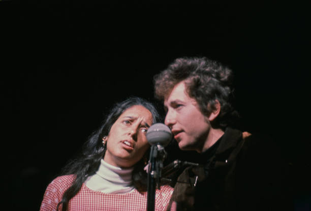 Joan Baez and Bob Dylan performing at the Newport Folk Festival at Freebody Park on Rhode Island, USA, 23rd-26th July 1964.