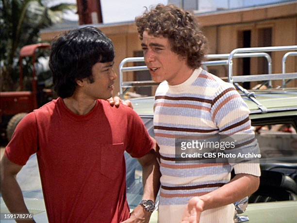 Patrick Adiarte as David and Barry Williams as Greg Brady in THE BRADY BUNCH episode, "Hawaii Bound." Original air date September 22, 1972. Image is...