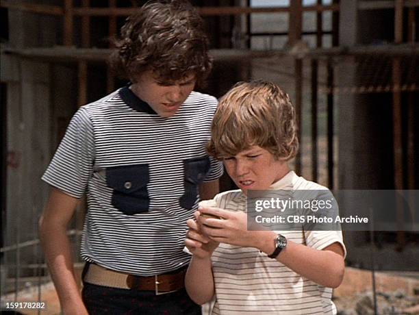 Christopher Knight as Peter Brady and Mike Lookinland as Bobby Brady in THE BRADY BUNCH episode, "Hawaii Bound." Original air date September 22,...