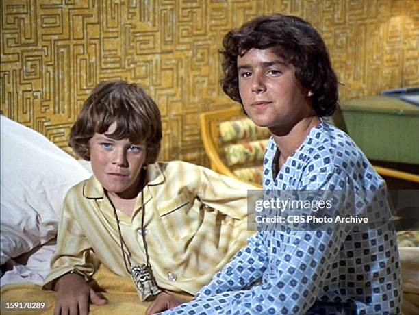 Mike Lookinland as Bobby Brady and Christopher Knight as Peter Brady in THE BRADY BUNCH episode, "Hawaii Bound." Original air date September 22,...