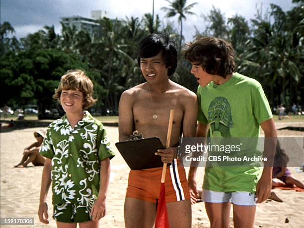 Mike Lookinland as Bobby Brady, Patrick Adiarte as David and Christopher Knight as Peter Brady in THE BRADY BUNCH episode, "Hawaii Bound." Original...