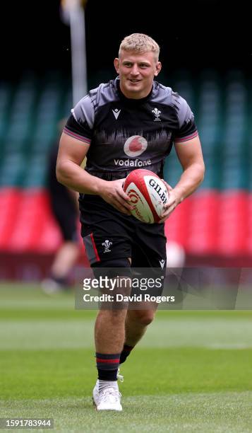 Jac Morgan runs with the ball during the Wales Captain's Run ahead of the Summer International match between Wales and England at the Principality...