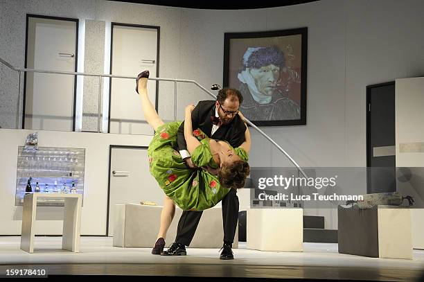 Alessija Lause and Nikolaus Szentmiklosi performs during the 'Geruechte...Geruechte...' photo rehearsal at Komoedie am Kurfuerstendamm Theater on...