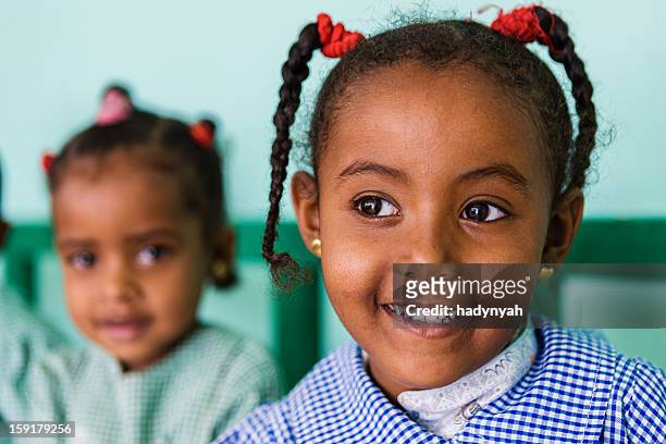 muslim schoolgirl in southern egypt - sudanese girls stock pictures, royalty-free photos & images