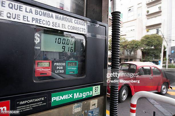 Gasoline prices are displayed on a pump at a Pemex station in Mexico City, Mexico, on Tuesday, Jan. 8, 2013. Mexico’s government is speeding up the...