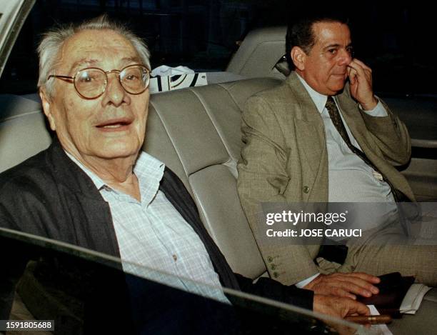 Luis Miquelena presidnt of the national assembly looks at photographers while leaving a special session of the legislative body 29 August in...