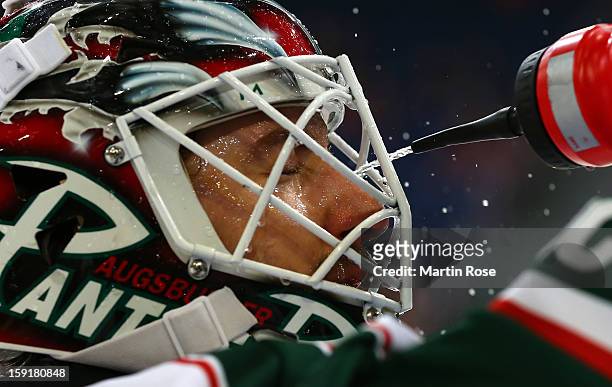 Patrick Ehelechner, goaltender of Augsburg tales a break during the DEL match between Hannover Scorpions and Augsburger Panther at TUI Arena at TUI...