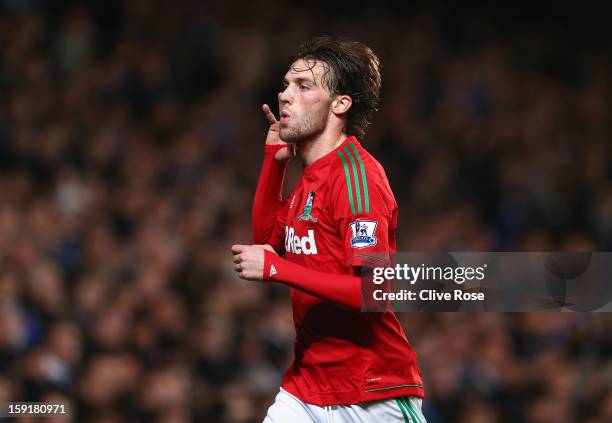 Michu of Swansea City celebrates scoring the opening goal during the Capital One Cup Semi-Final first leg match between Chelsea and Swansea City at...