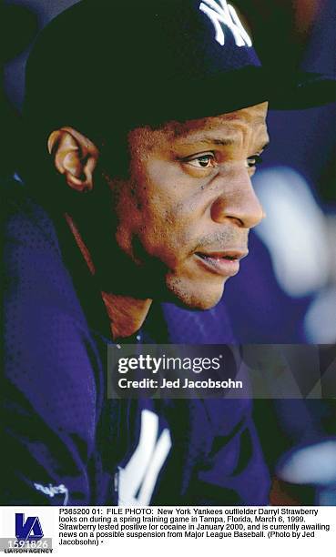 New York Yankees outfielder Darryl Strawberry looks on during a spring training game in Tampa, Florida, March 6, 1999. Strawberry tested positive for...